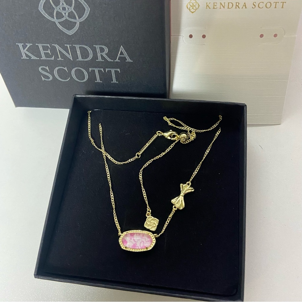 Kendra Scott Gold Necklace with Pink Marbled Pendant and Bow Charm - Picture 3 of 5
